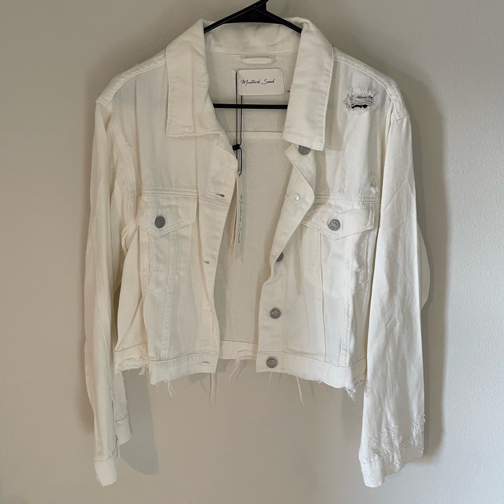 Distressed denim jacket